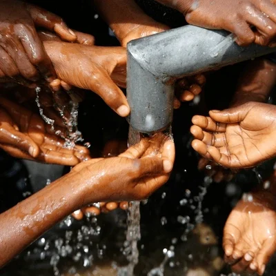 african-children-hands-under-running-600nw-2689387727